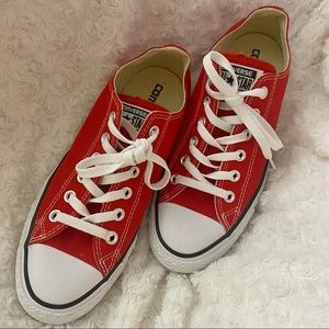 Red white low top converse sneakers